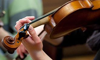 student playing violin