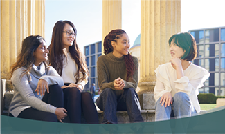four female students talking