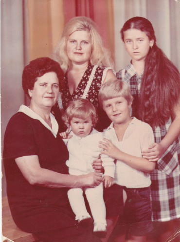 Vlad Mykhnenko (aged 8), with his brother, maternal grandmother, mother, and first cousin, Donetsk, summer 1983.