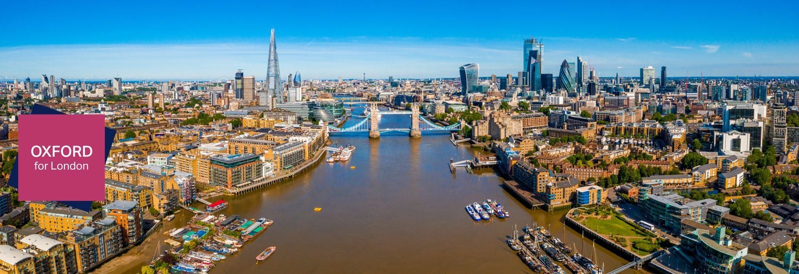 View of the Financial District of London near the Tower Bridge across river Thames, London.