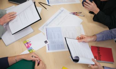 Reviewing information on paper and in notebooks