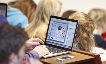 Student uses laptop in lecture