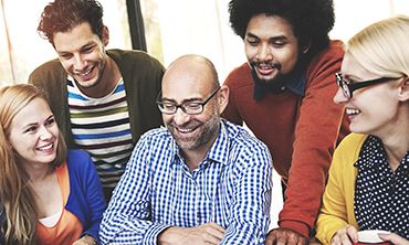 a group of smiling people