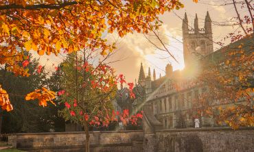 Autumnal trees at sunset in Magdalen College